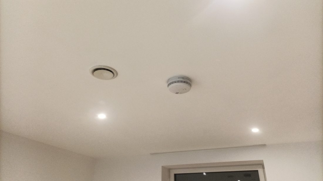 Painted ceiling with recessed lights